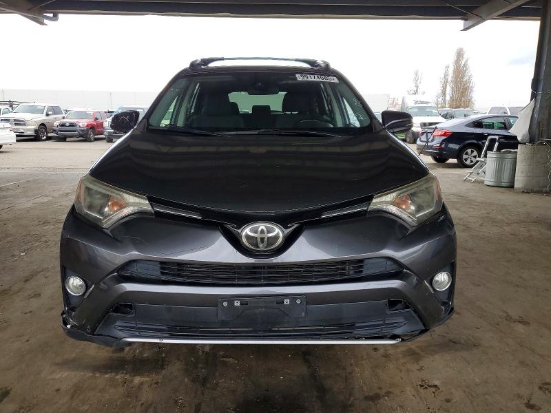 Photo 5 from auction – 2017 TOYOTA RAV4 with VIN JTMWFREV5HD106515