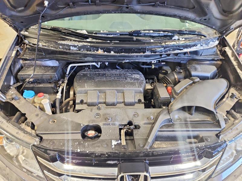 Photo 12 from auction – 2016 HONDA ODYSSEY with VIN 5FNRL5H67GB030452
