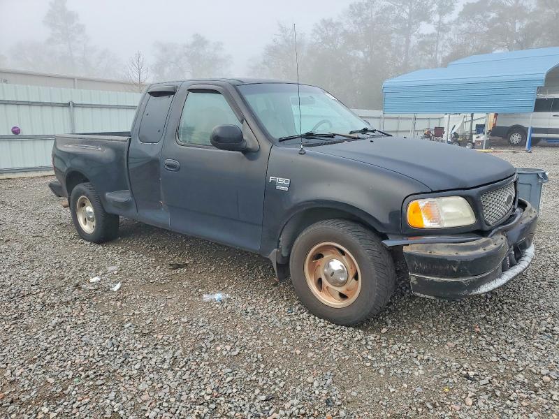 Photo 4 from auction – 1999 FORD F150 with VIN 1FTRX07W0XKB26788