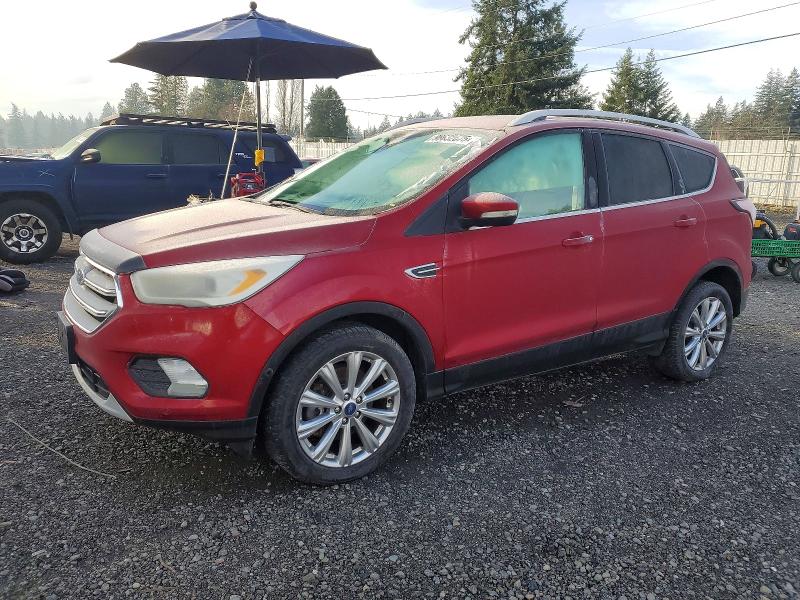 Photo 1 from auction – 2018 FORD ESCAPE TIT with VIN 1FMCU9J98JUC10354