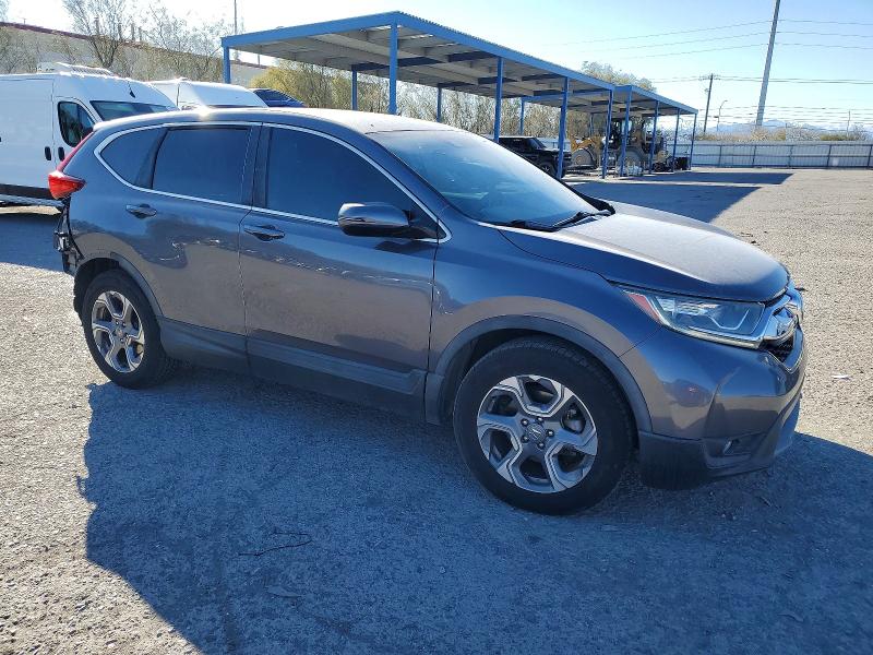 Photo 4 from auction – 2019 HONDA CR-V with VIN 7FARW1H59KE030263