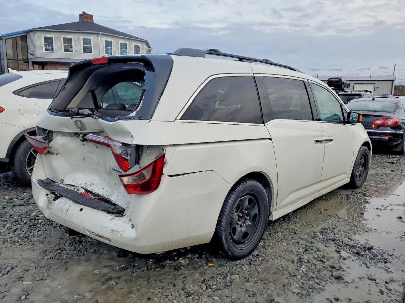 Photo 3 from auction – 2012 HONDA ODYSSEY TO with VIN 5FNRL5H95CB047030