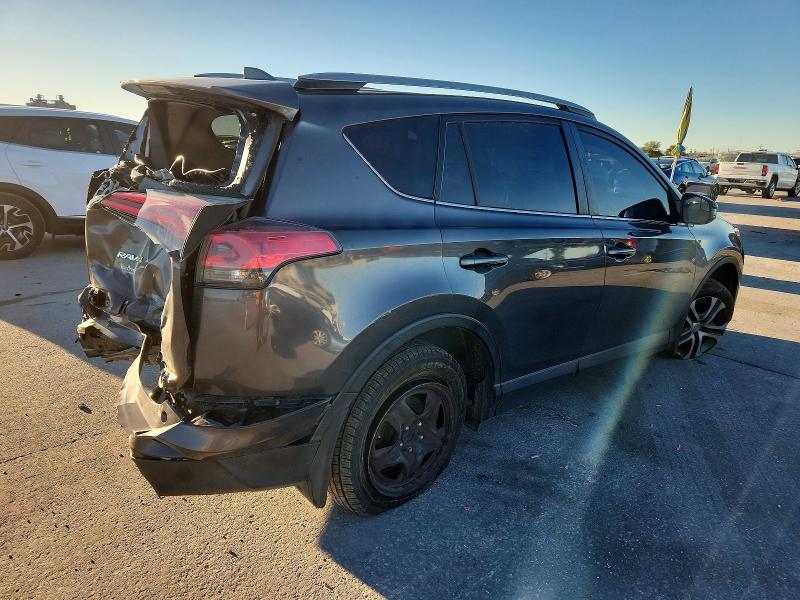 Photo 3 from auction – 2018 TOYOTA RAV4 LE with VIN JTMZFREV2JJ201778