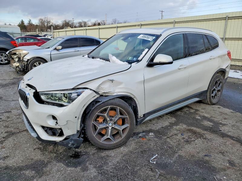BMW X1 XDRIVE2 2018 with VIN WBXHT3C32J3F03925 - Photo from auction