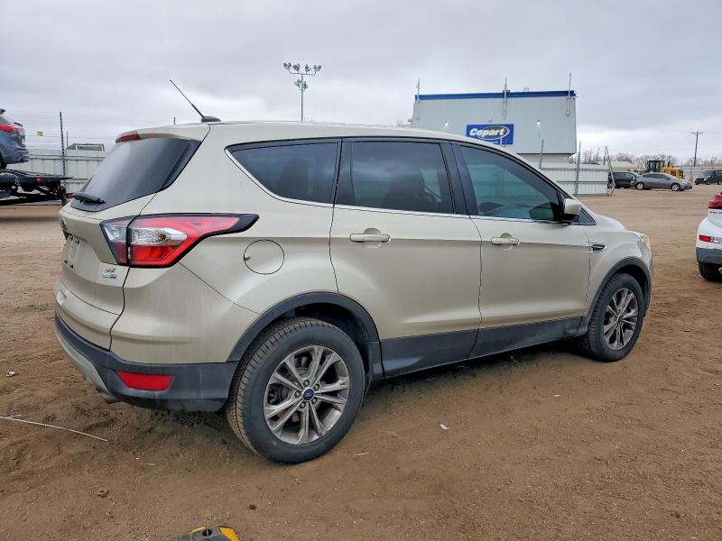 Photo 3 from auction – 2017 FORD ESCAPE SE with VIN 1FMCU9GD4HUD76537