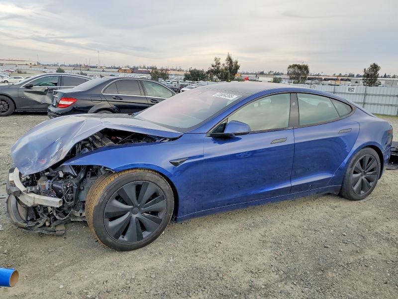 TESLA MODEL S 2023 with VIN 5YJSA1E55PF515667 - Photo from auction