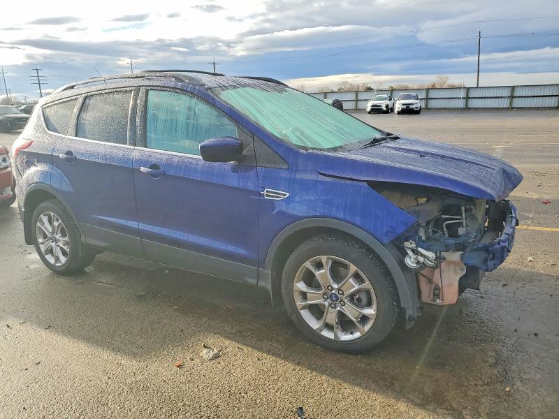 Photo 4 from auction – 2014 FORD ESCAPE SE with VIN 1FMCU9G96EUB32590
