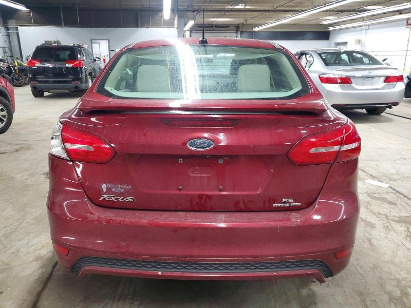 Photo 6 from auction – 2015 FORD FOCUS SE with VIN 1FADP3F21FL248049