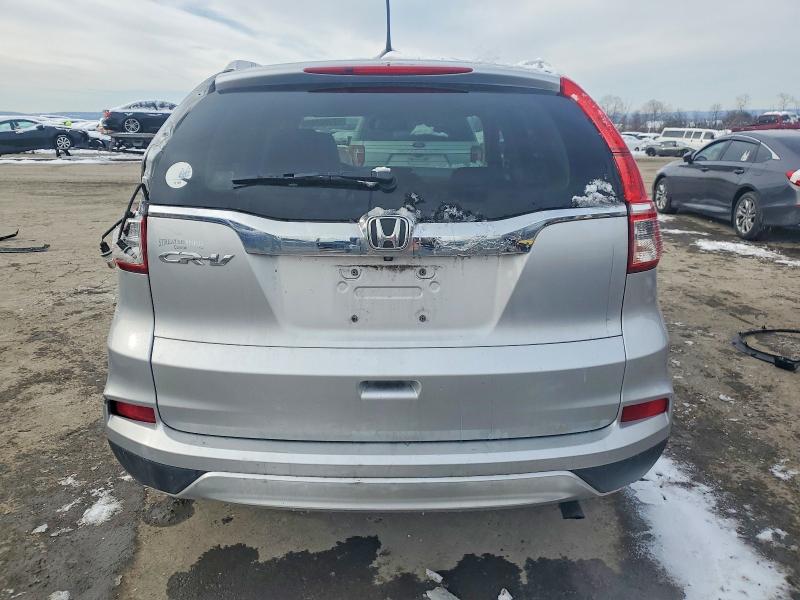 Photo 6 from auction – 2016 HONDA CR-V EXL with VIN 5J6RM3H7XGL022217