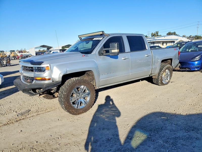 CHEVROLET SILVERADO 2018 with VIN 3GCUKREC2JG493860 - Photo from auction