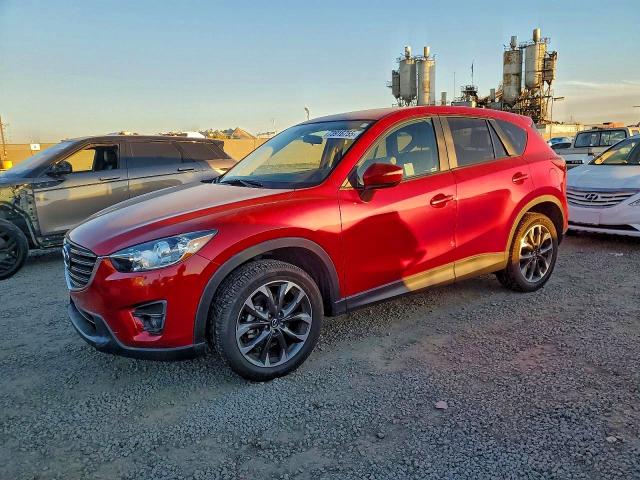 MAZDA CX-5 GT 2016 with VIN JM3KE2DY0G0773459 - Photo from auction
