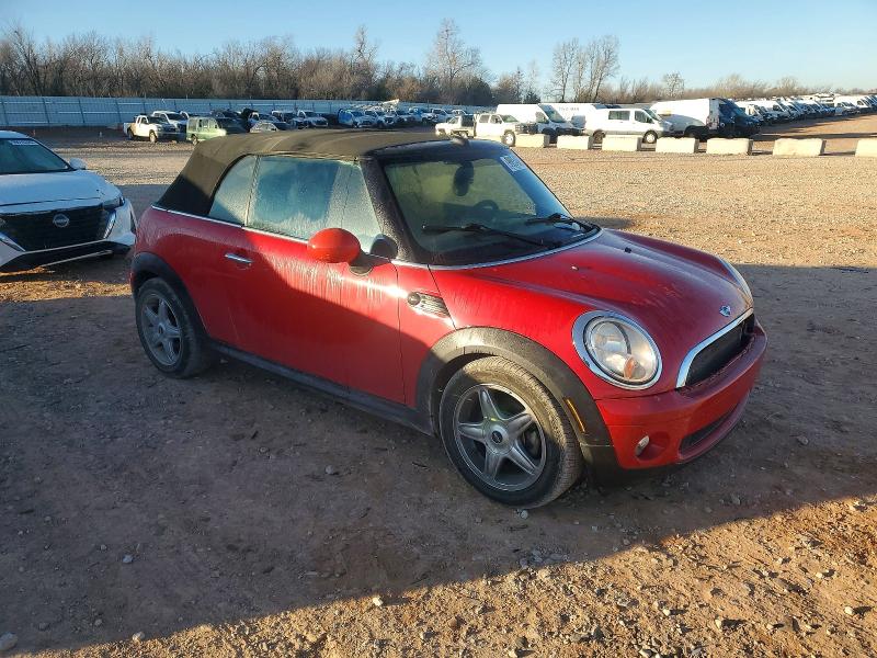 Photo 4 from auction – 2010 MINI COOPER with VIN WMWMR3C54ATU97972