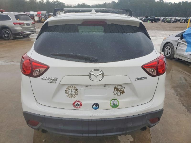 Photo 6 from auction – 2013 MAZDA CX-5 TOURI with VIN JM3KE4CE7D0128760