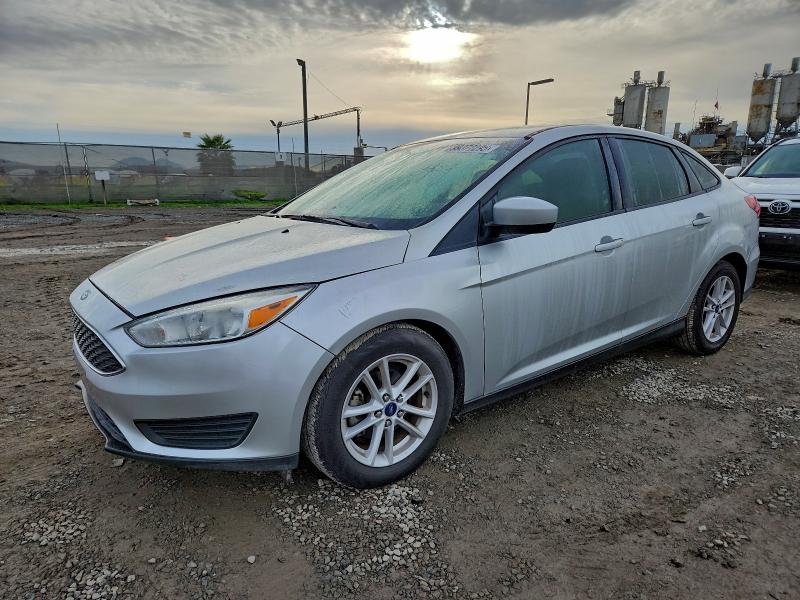 FORD FOCUS SE 2018 with VIN 1FADP3FEXJL205493 - Photo from auction