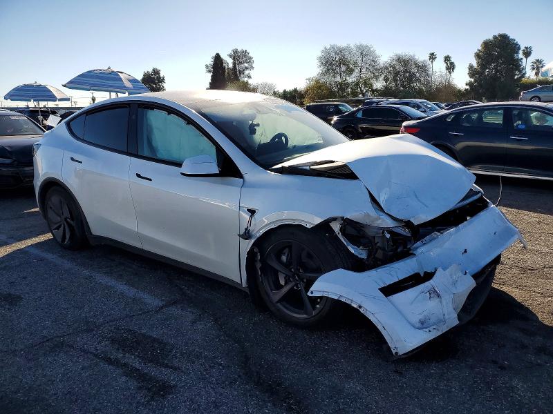 Photo 4 from auction – 2026 TESLA MODEL Y with VIN 7SAYGDED2TF389119