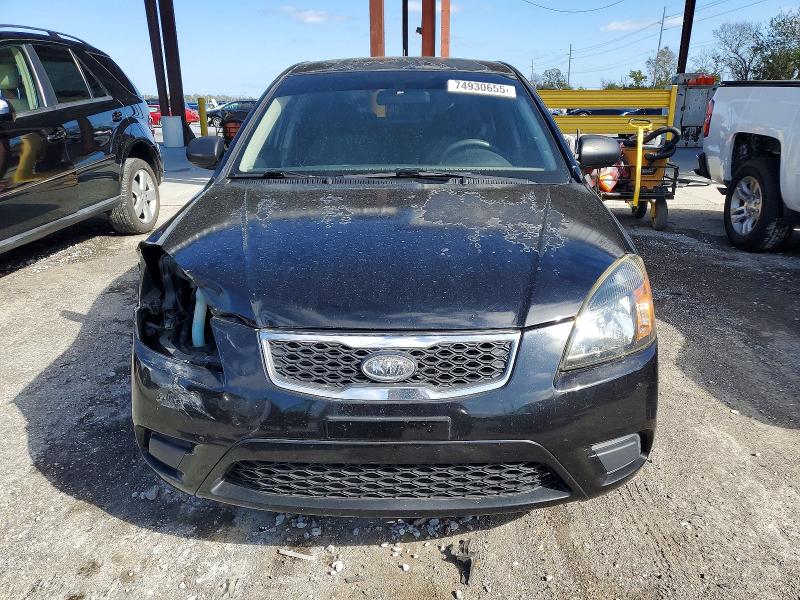 Photo 5 from auction – 2011 KIA RIO BASE with VIN KNADH4A3XB6959767