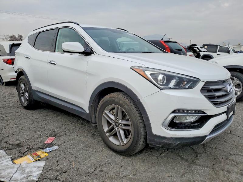 Photo 4 from auction – 2017 HYUNDAI SANTA FE S with VIN 5NMZU3LB7HH008473