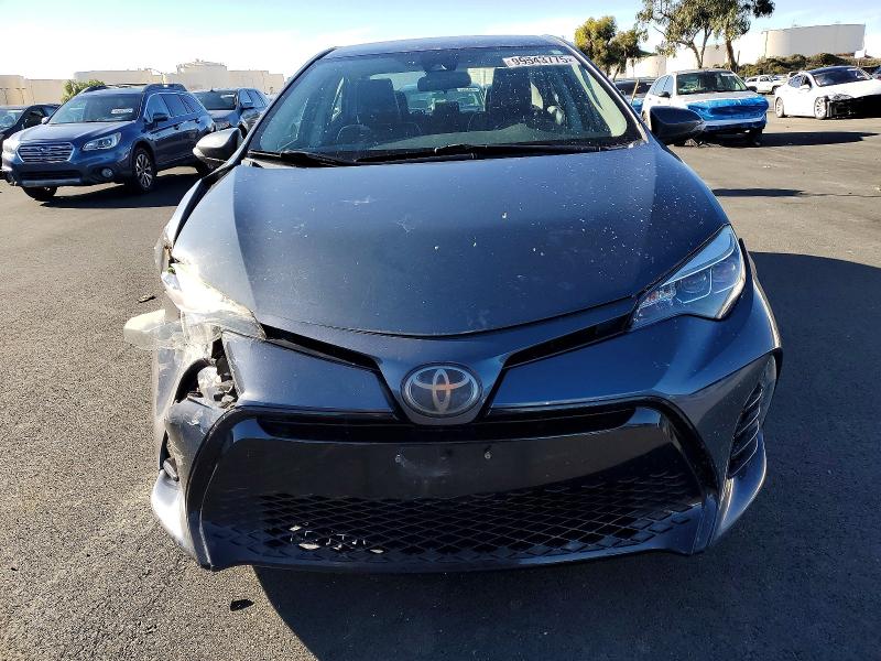 Photo 5 from auction – 2018 TOYOTA COROLLA L with VIN 5YFBURHE7JP792527
