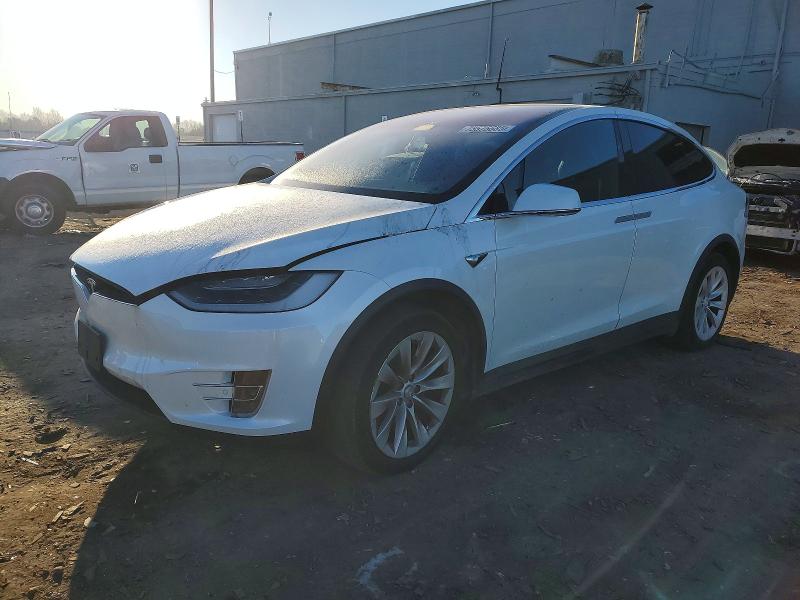 TESLA MODEL X 2017 with VIN 5YJXCAE23HF067825 - Photo from auction