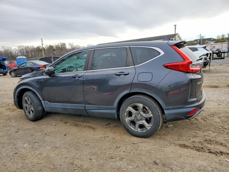 Photo 2 from auction – 2019 HONDA CR-V with VIN 5J6RW2H8XKL000868