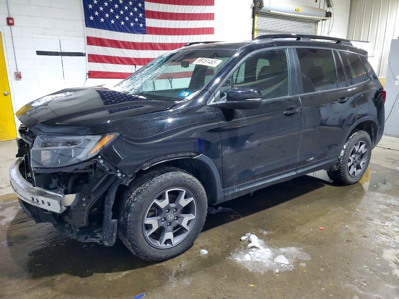 Photo 1 from auction – 2022 HONDA PASSPORT T with VIN 5FNYF8H61NB016080