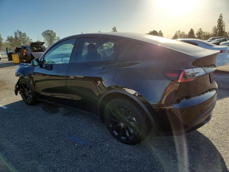 Photo 2 from auction – 2021 TESLA MODEL Y with VIN 5YJYGDEE2MF138897