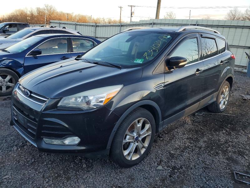 FORD ESCAPE 2014 with VIN 1FMCU9J96EUE58169 - Photo from auction