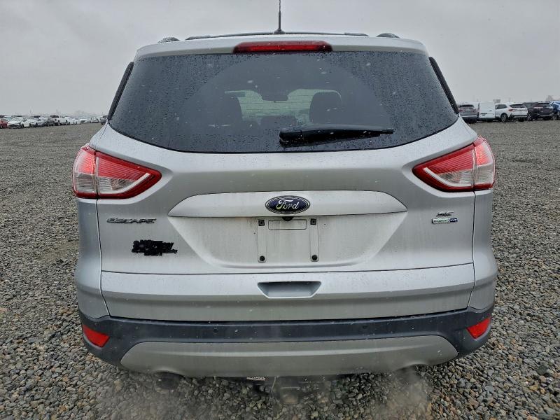 Photo 6 from auction – 2016 FORD ESCAPE SE with VIN 1FMCU9G92GUB98458