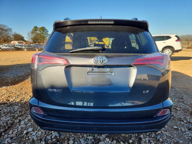 Photo 6 from auction – 2018 TOYOTA RAV4 LE with VIN JTMZFREV1JJ733832