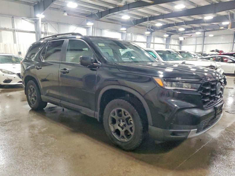 Photo 4 from auction – 2025 HONDA PILOT TRAI with VIN 5FNYG1H63SB089905