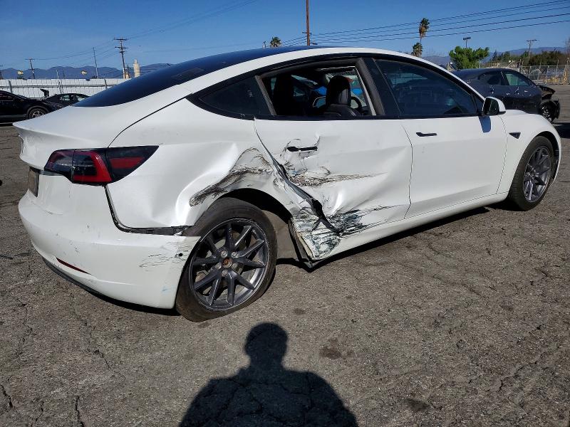Photo 3 from auction – 2022 TESLA MODEL 3 with VIN 5YJ3E1EAXNF156979