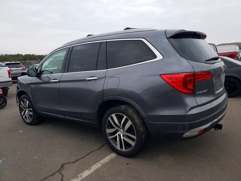 Photo 2 from auction – 2016 HONDA PILOT TOUR with VIN 5FNYF6H98GB123497