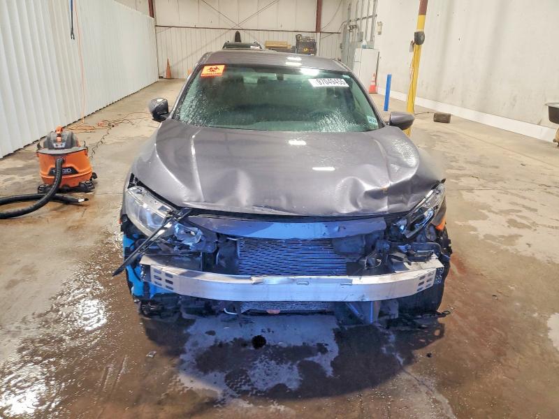 Photo 5 from auction – 2018 HONDA CIVIC LX with VIN 2HGFC2F52JH601988