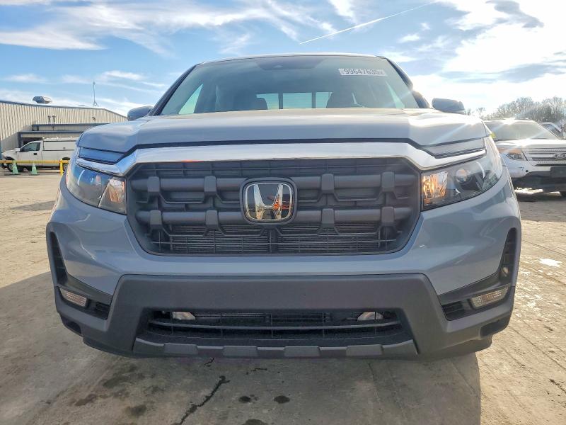 Photo 5 from auction – 2024 HONDA RIDGELINE with VIN 5FPYK3F52RB032861
