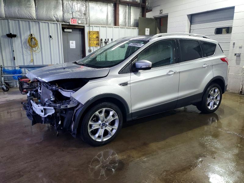 FORD ESCAPE TIT 2014 with VIN 1FMCU0J95EUE55601 - Photo from auction