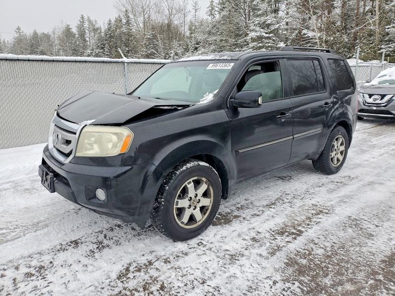HONDA PILOT TOUR 2009 with VIN 5FNYF48869B012235 - Photo from auction