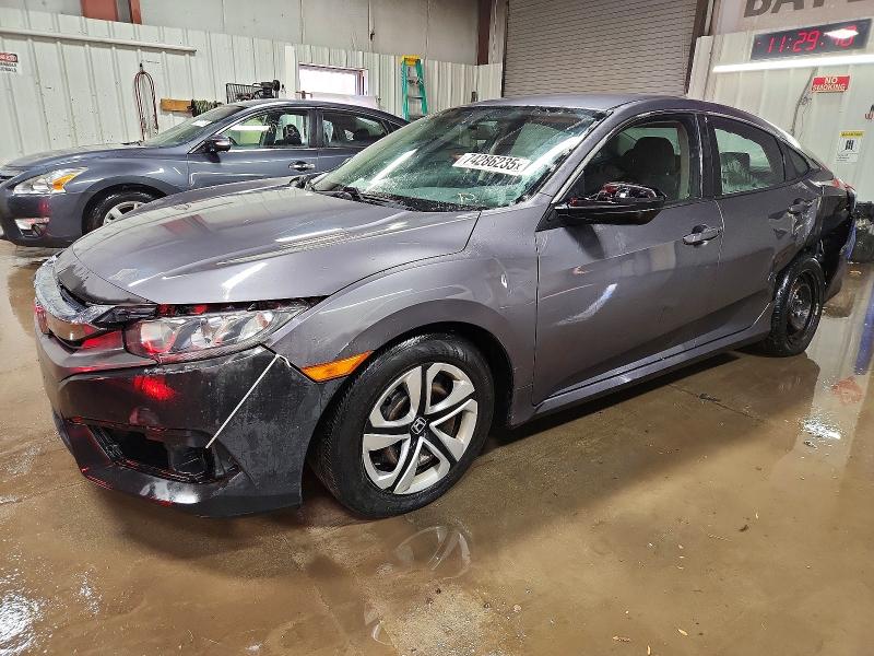 HONDA CIVIC LX 2017 with VIN 19XFC2E54HE064725 - Photo from auction