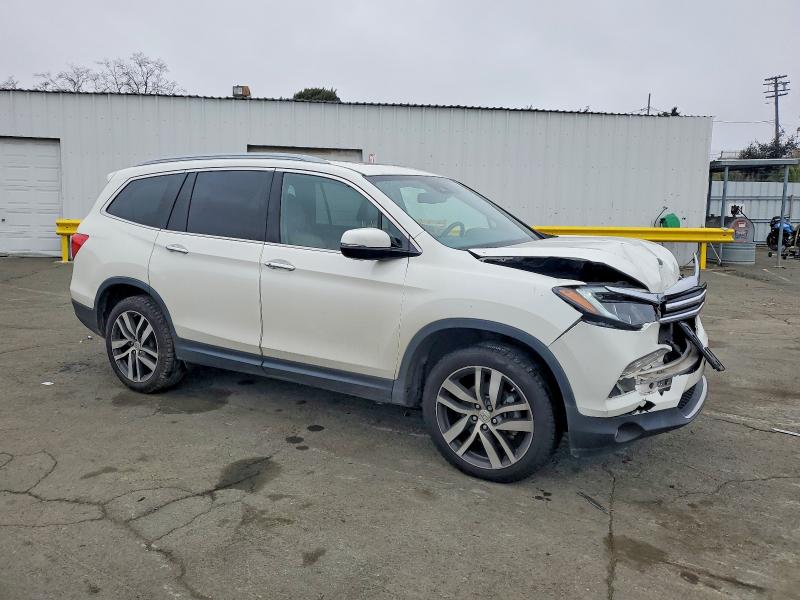 Photo 4 from auction – 2018 HONDA PILOT ELIT with VIN 5FNYF6H06JB019826