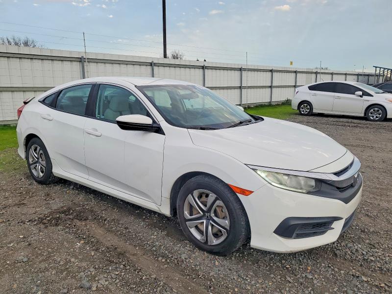 Photo 4 from auction – 2018 HONDA CIVIC LX with VIN 19XFC2F53JE202873
