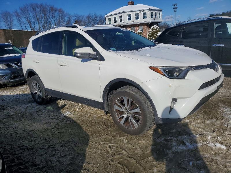Photo 4 from auction – 2016 TOYOTA RAV4 XLE with VIN JTMRFREV9GD184078