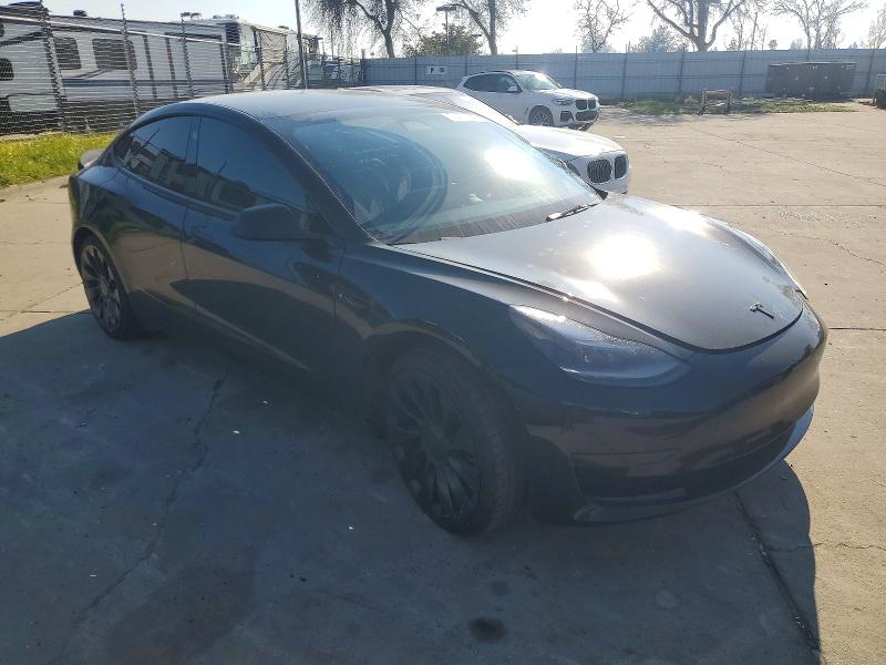 Photo 4 from auction – 2021 TESLA MODEL 3 with VIN 5YJ3E1EC8MF099343