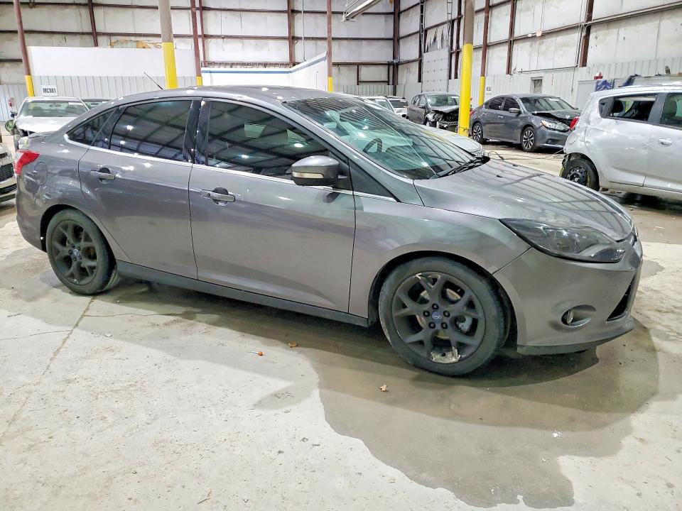 Photo 4 from auction – 2014 FORD FOCUS TITA with VIN 1FADP3J21EL137068