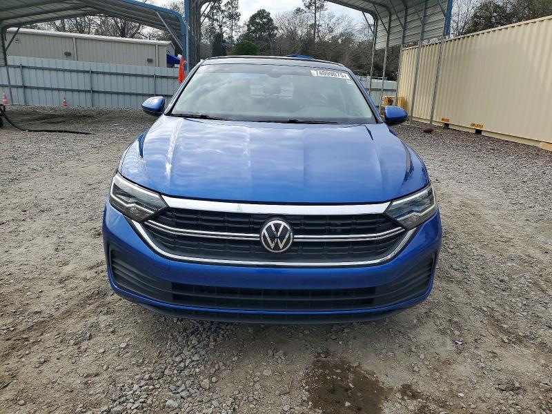 Photo 5 from auction – 2022 VOLKSWAGEN JETTA with VIN 3VW7M7BU2NM013703