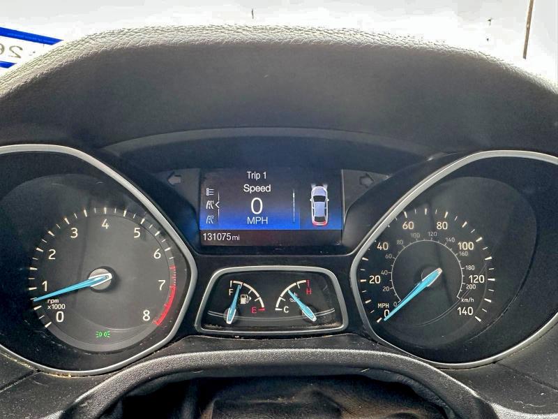 Photo 8 from auction – 2015 FORD FOCUS S with VIN 1FADP3E21FL374591