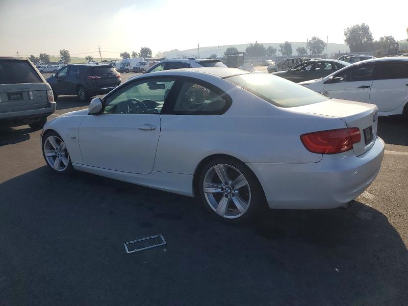 Photo 2 from auction – 2011 BMW 3 SERIES with VIN WBAKE5C55BE573008