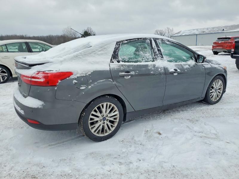 Photo 3 from auction – 2018 FORD FOCUS with VIN 1FADP3J27JL279399
