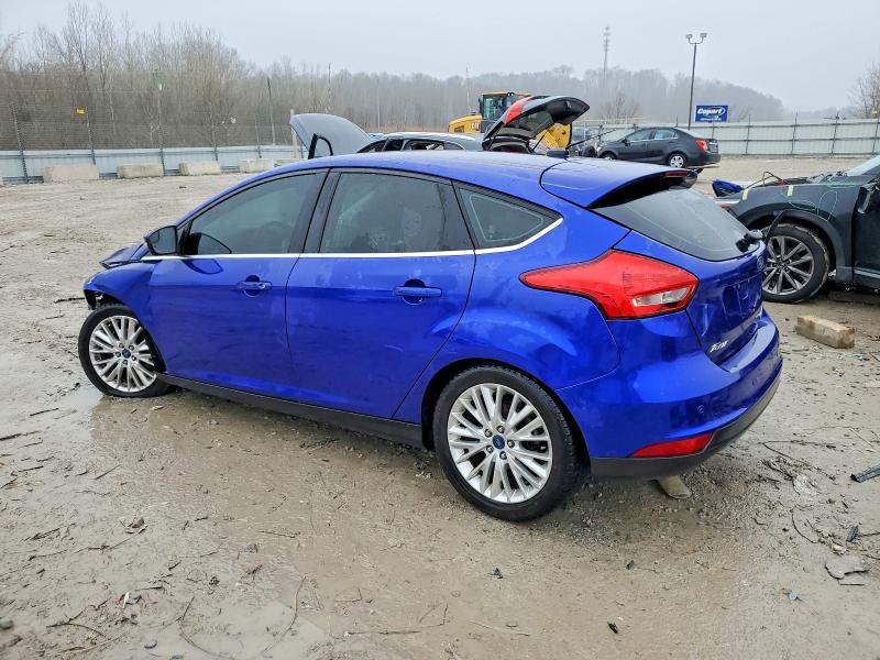Photo 2 from auction – 2015 FORD FOCUS TITA with VIN 1FADP3N27FL274334