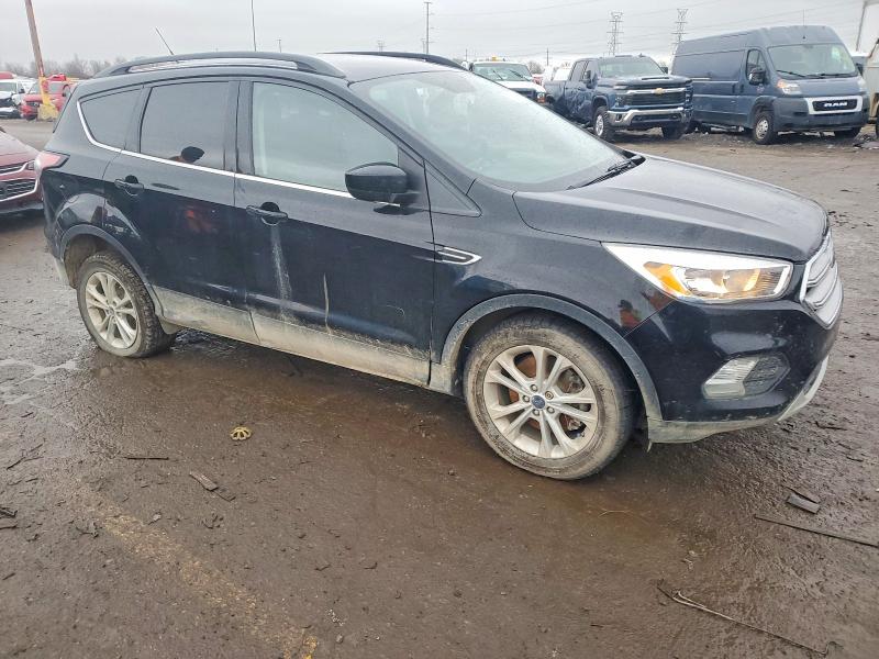 Photo 4 from auction – 2018 FORD ESCAPE SE with VIN 1FMCU9GD0JUC37348