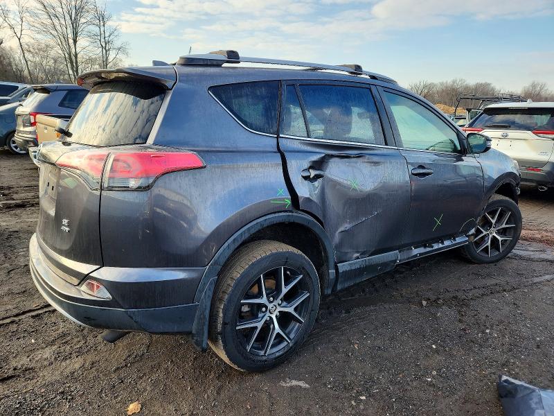 Photo 3 from auction – 2018 TOYOTA RAV4 SE with VIN JTMJFREV0JJ205955