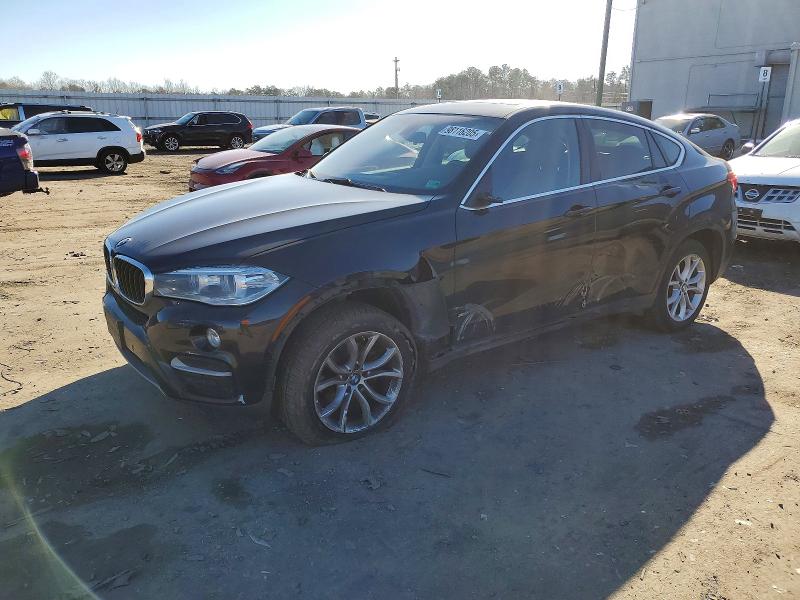 BMW X6 2015 with VIN 5UXKU2C5XF0N77058 - Photo from auction